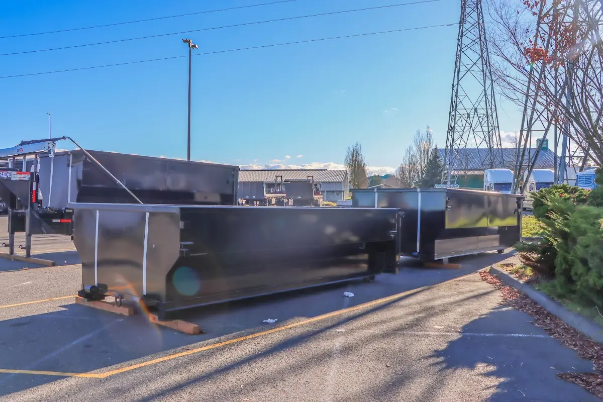Roll-off dumpster ready for waste disposal at job site for Roofing Dumpster Rental in Somersworth